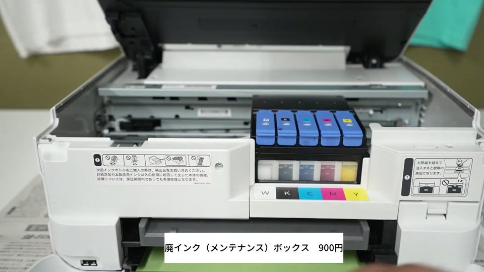小型DTF A4機の前面下部にある廃インク(メンテナンス)ボックスを指している様子